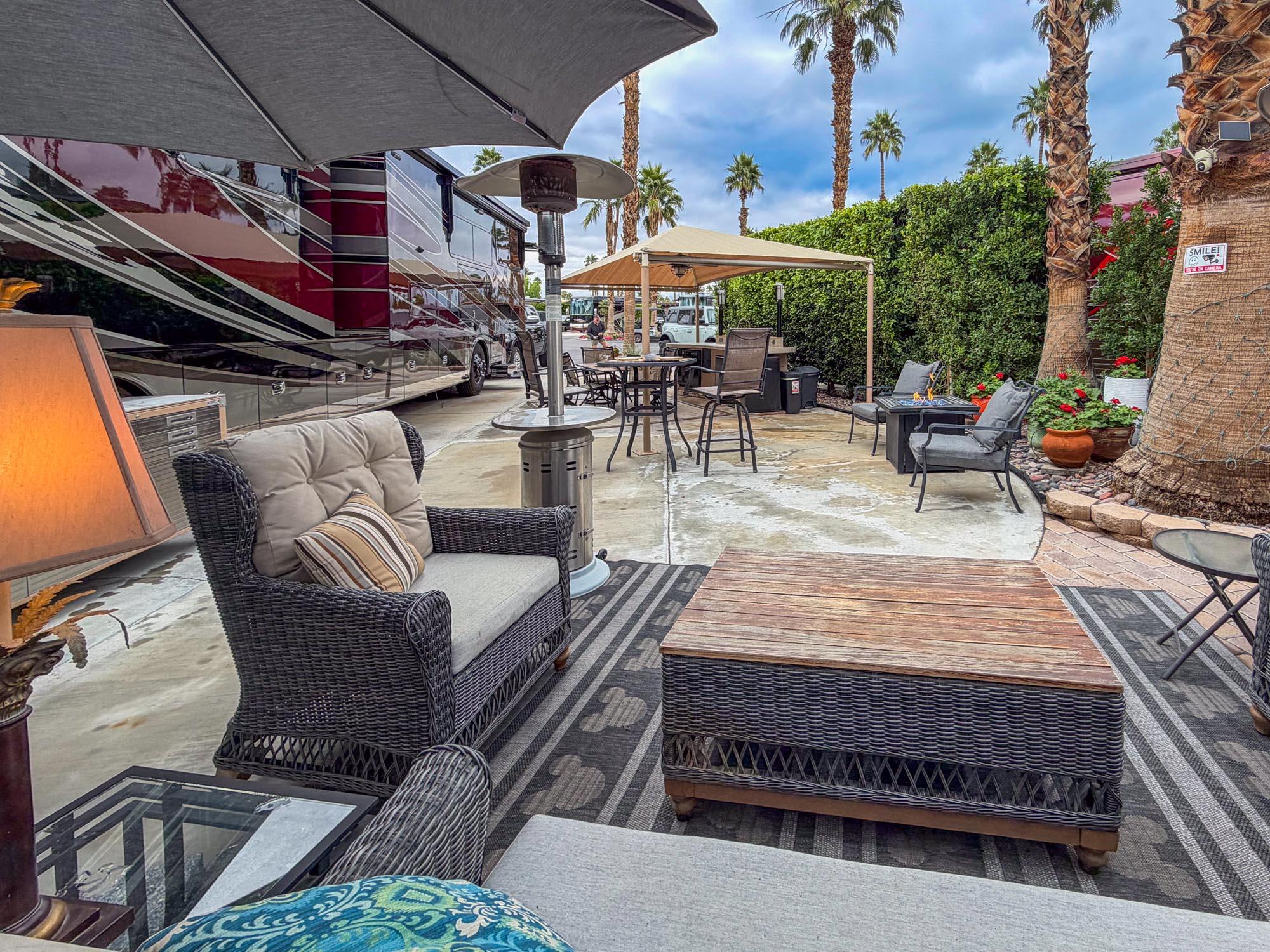 80394 Ave 48, Unit 90 Indio, CA 92201 - Photo 26 of 29 an outdoor sitting area with a table and chairs