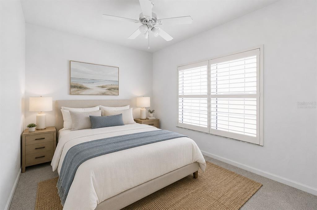 8411 Placida Road, Unit 407 Placida, FL 33946 - Photo 23 of 43 a bedroom with a bed and a window