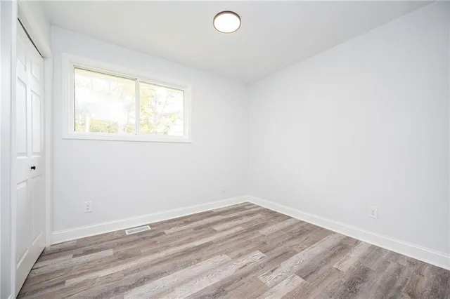 a view of a room that has a window in it