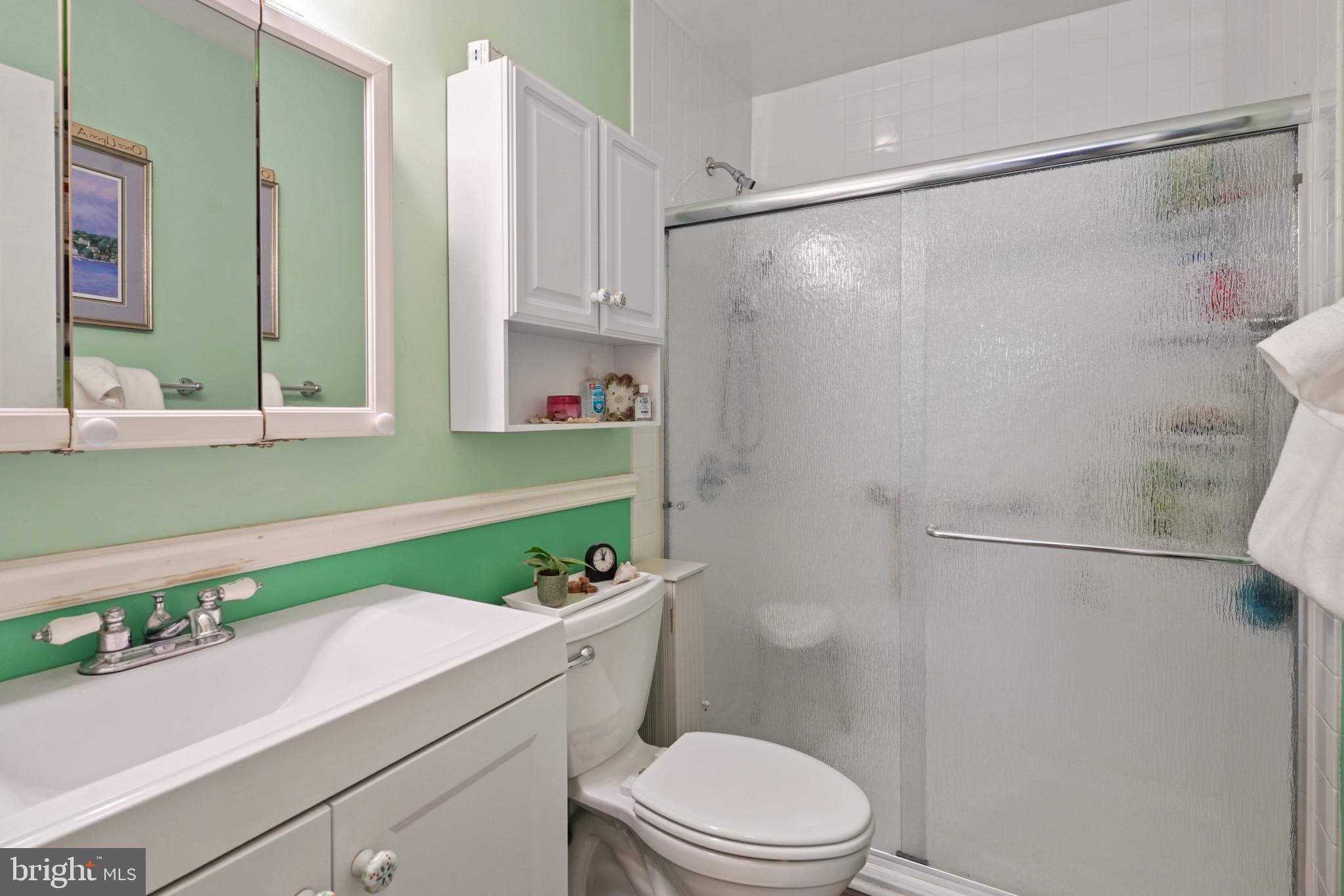 12733 Cunninghill Cove Road Middle River, MD 21220 - Photo 25 of 32 a bathroom with a sink and a mirror