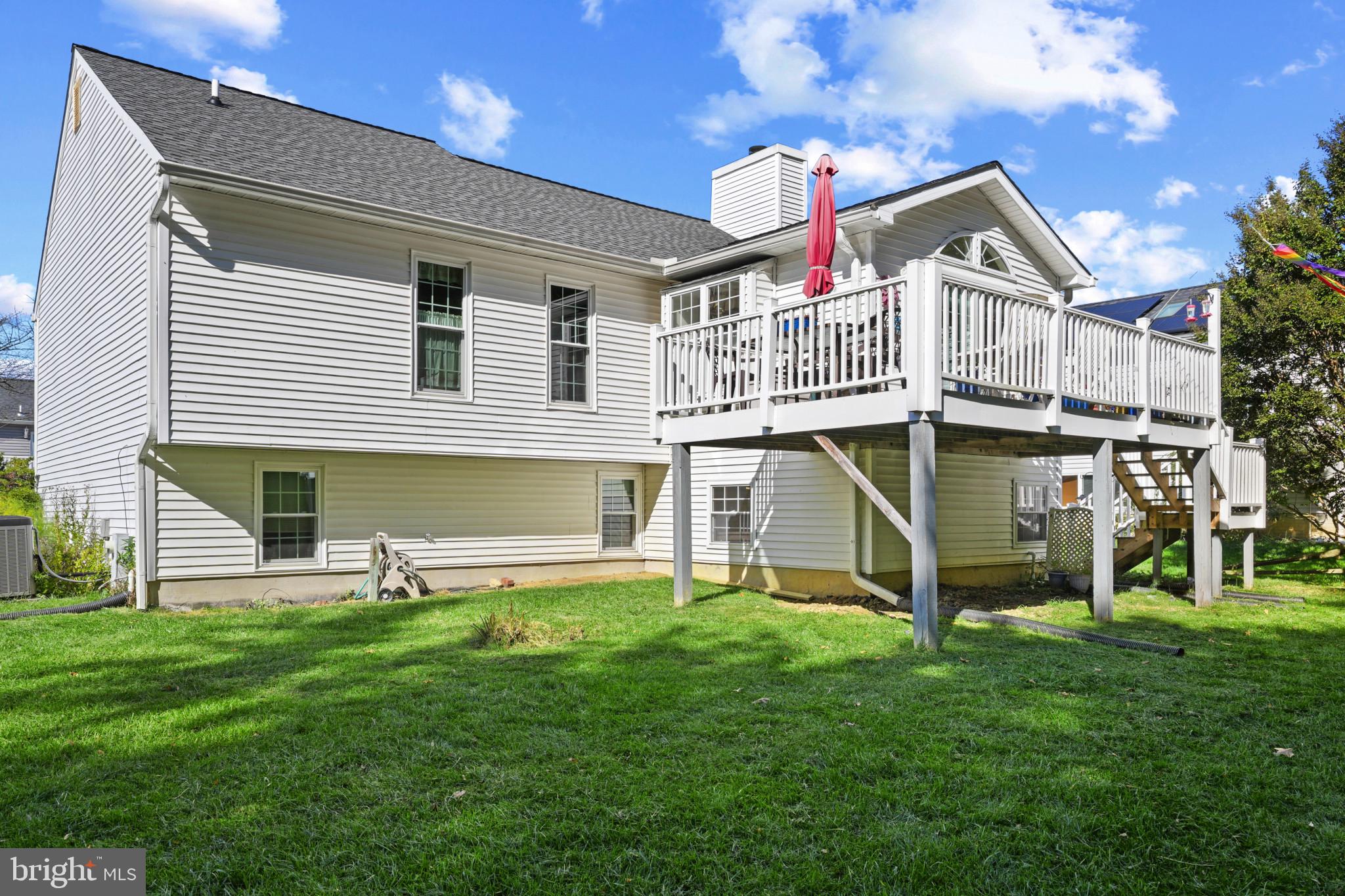 12733 Cunninghill Cove Road Middle River, MD 21220 - Photo 31 of 32 a view of a house with a yard and sitting area
