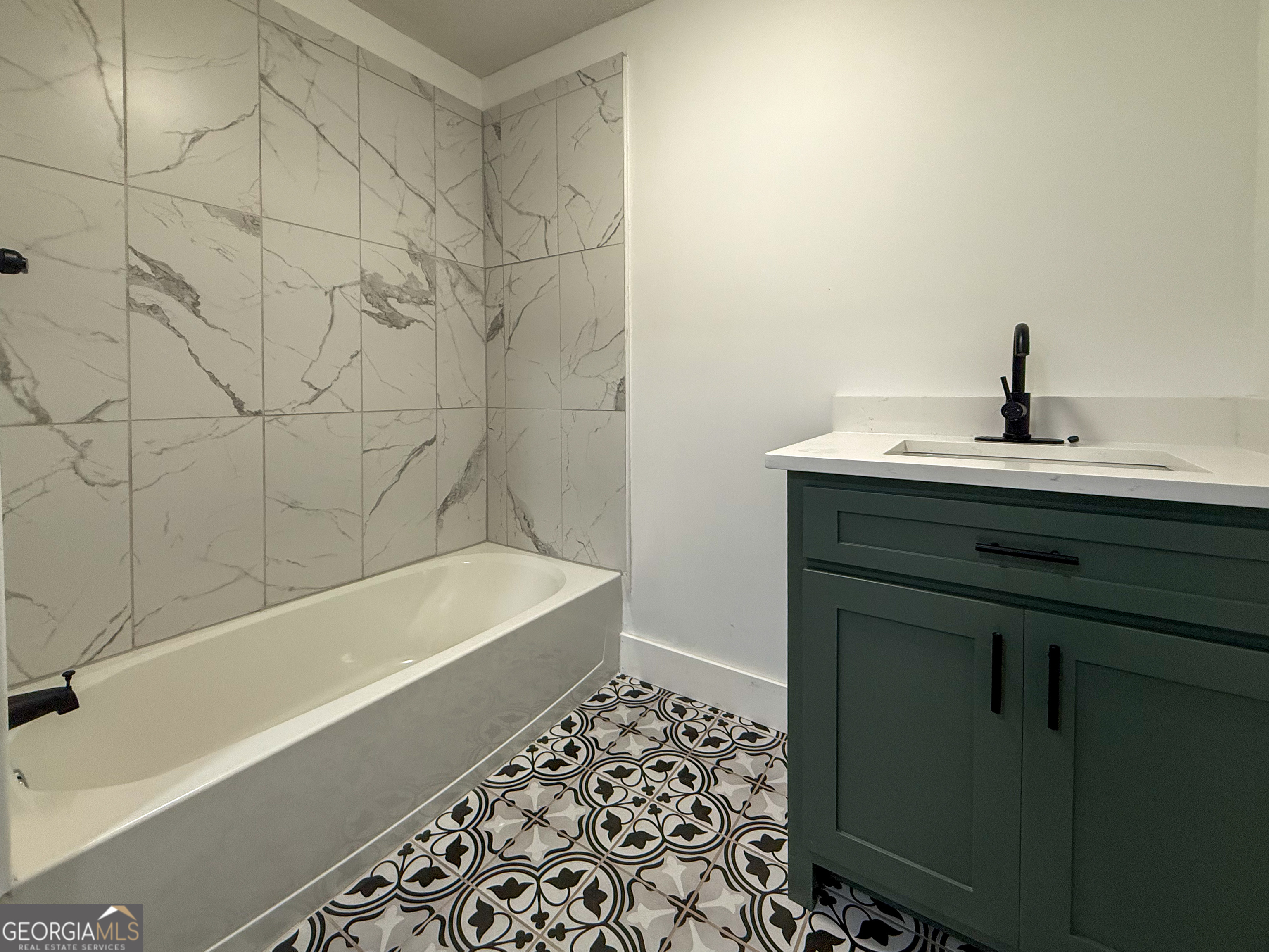 2301 Highway 254 Cleveland, GA 30528 - Photo 14 of 23 a bathroom with a bathtub and a sink