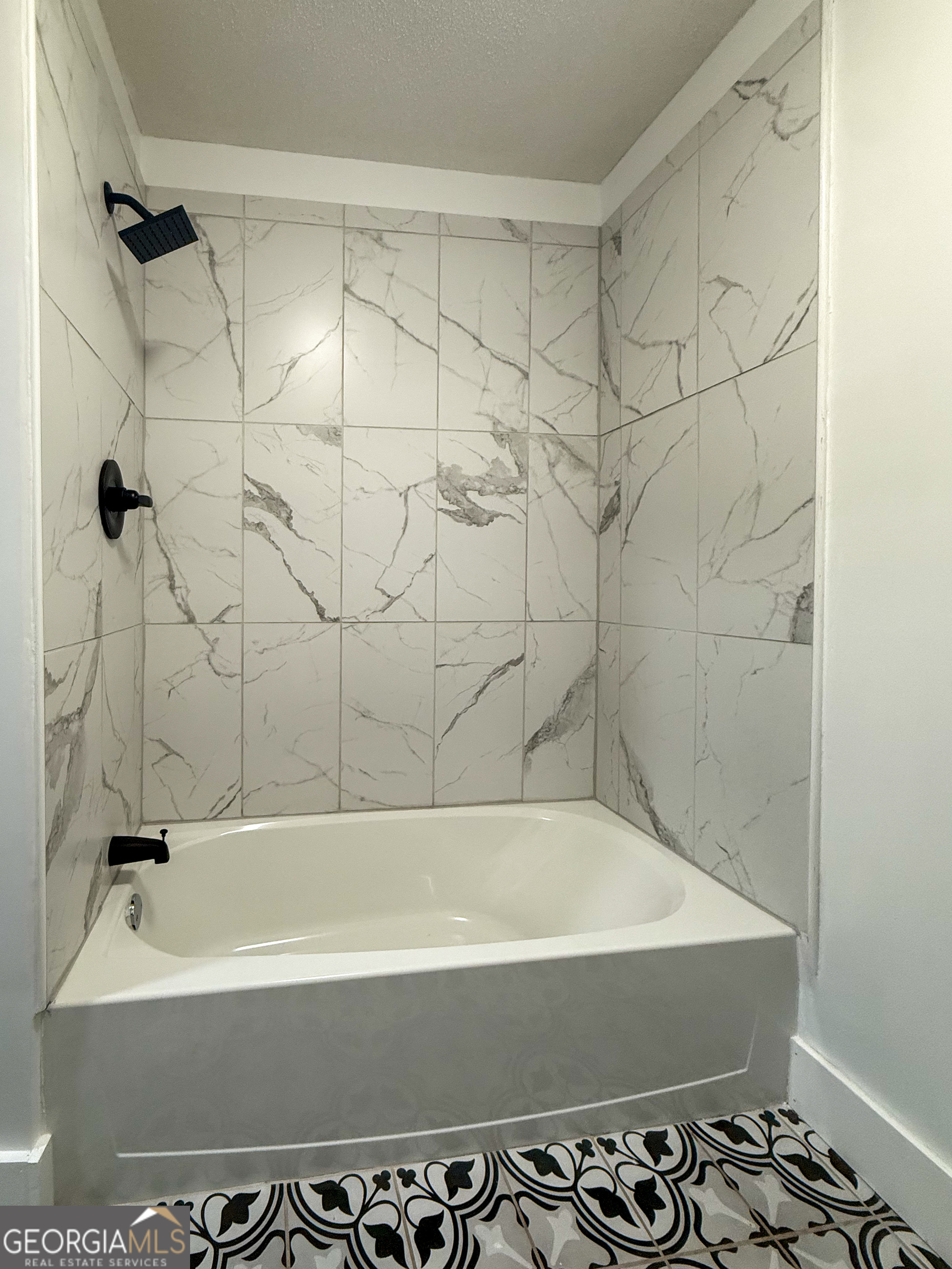 2301 Highway 254 Cleveland, GA 30528 - Photo 15 of 23 a bathroom with a bathtub and a shower