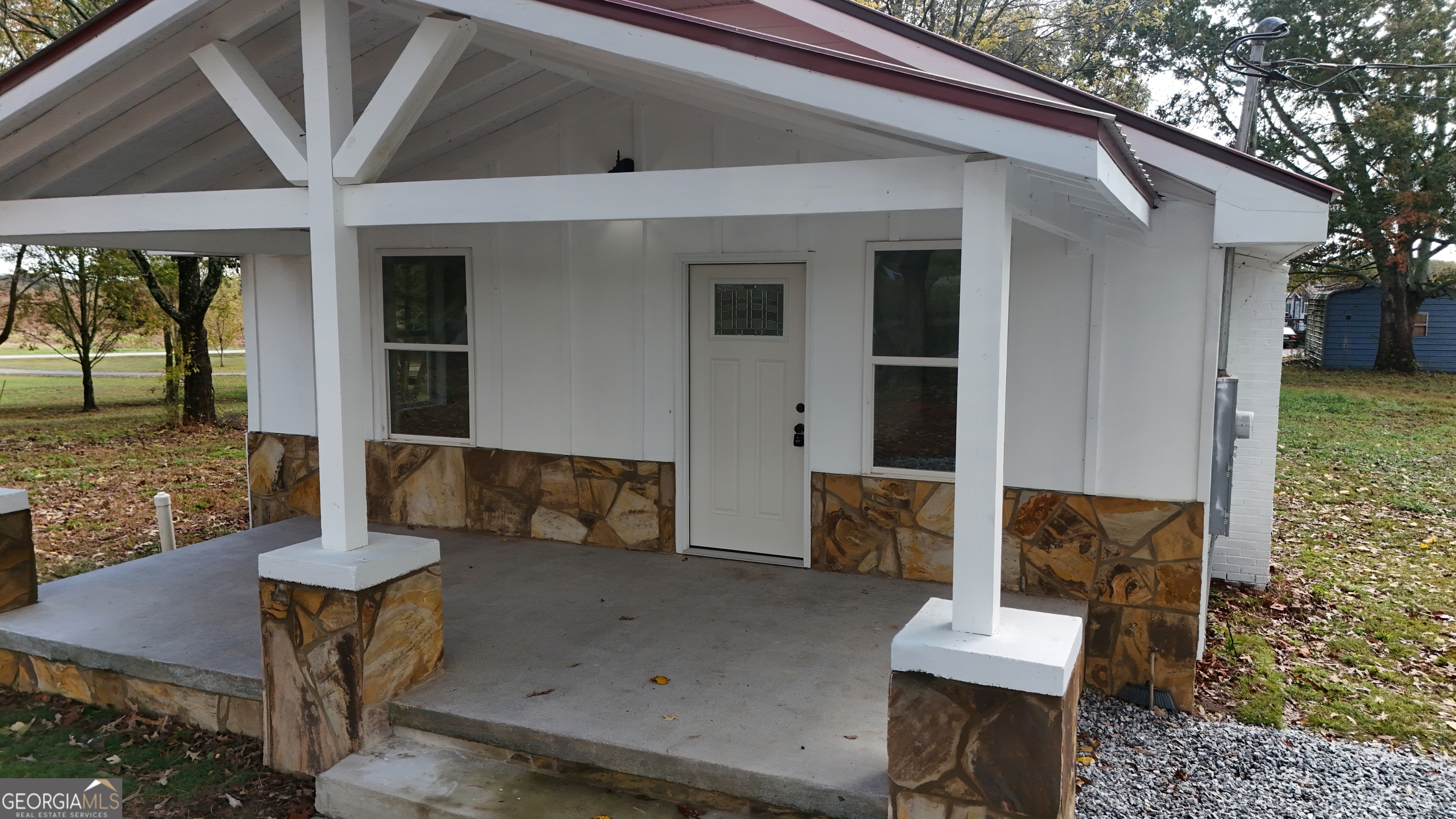 2301 Highway 254 Cleveland, GA 30528 - Photo 2 of 23 a front view of a house with a yard