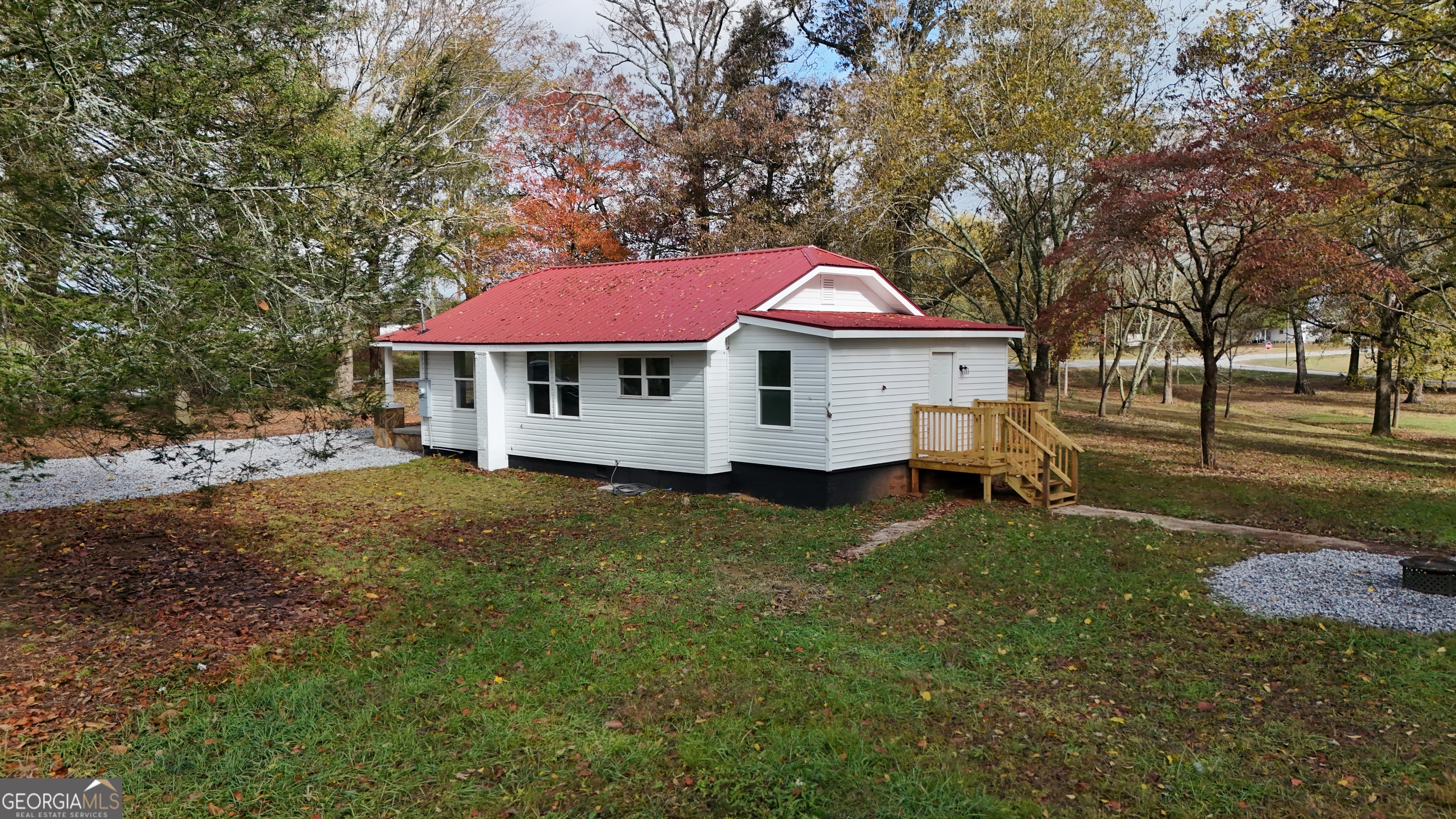 2301 Highway 254 Cleveland, GA 30528 - Photo 21 of 23 a house with trees in the background