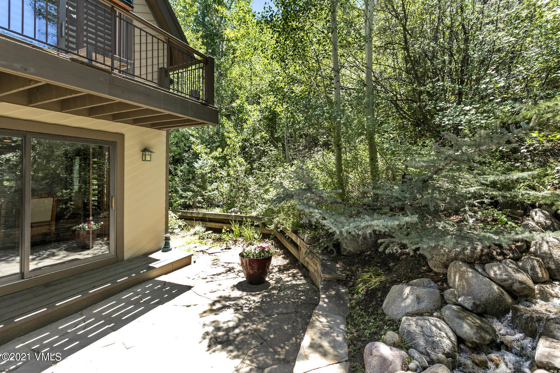 850 Eagle Drive Eagle-Vail, CO 81620 - Photo 12 of 44 a pathway of a house with a yard