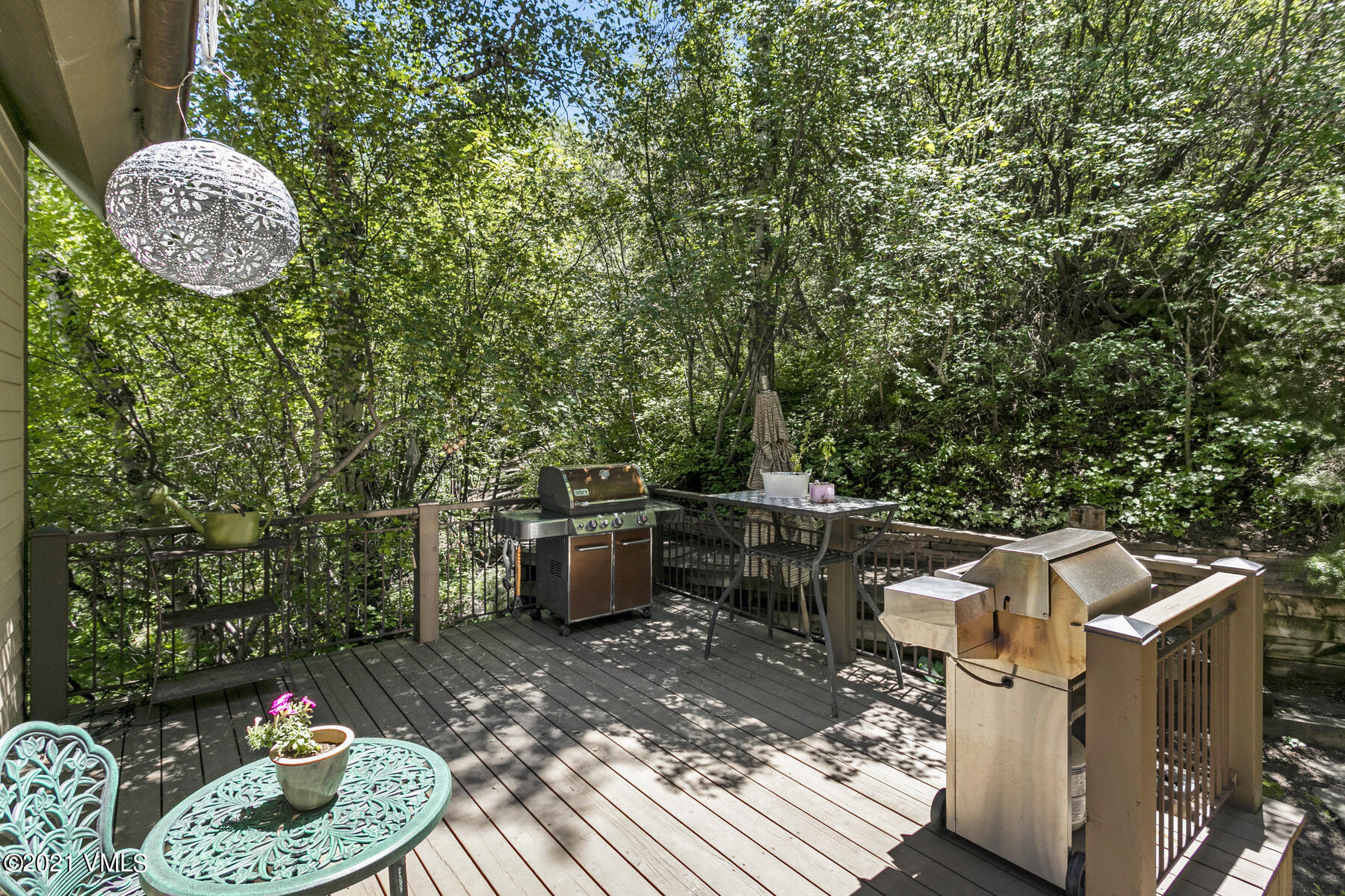 850 Eagle Drive Eagle-Vail, CO 81620 - Photo 14 of 44 a view of a backyard with plants and outdoor seating