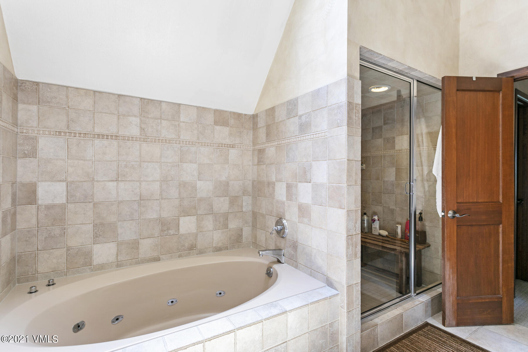 850 Eagle Drive Eagle-Vail, CO 81620 - Photo 21 of 44 a bathroom with a bathtub and a shower