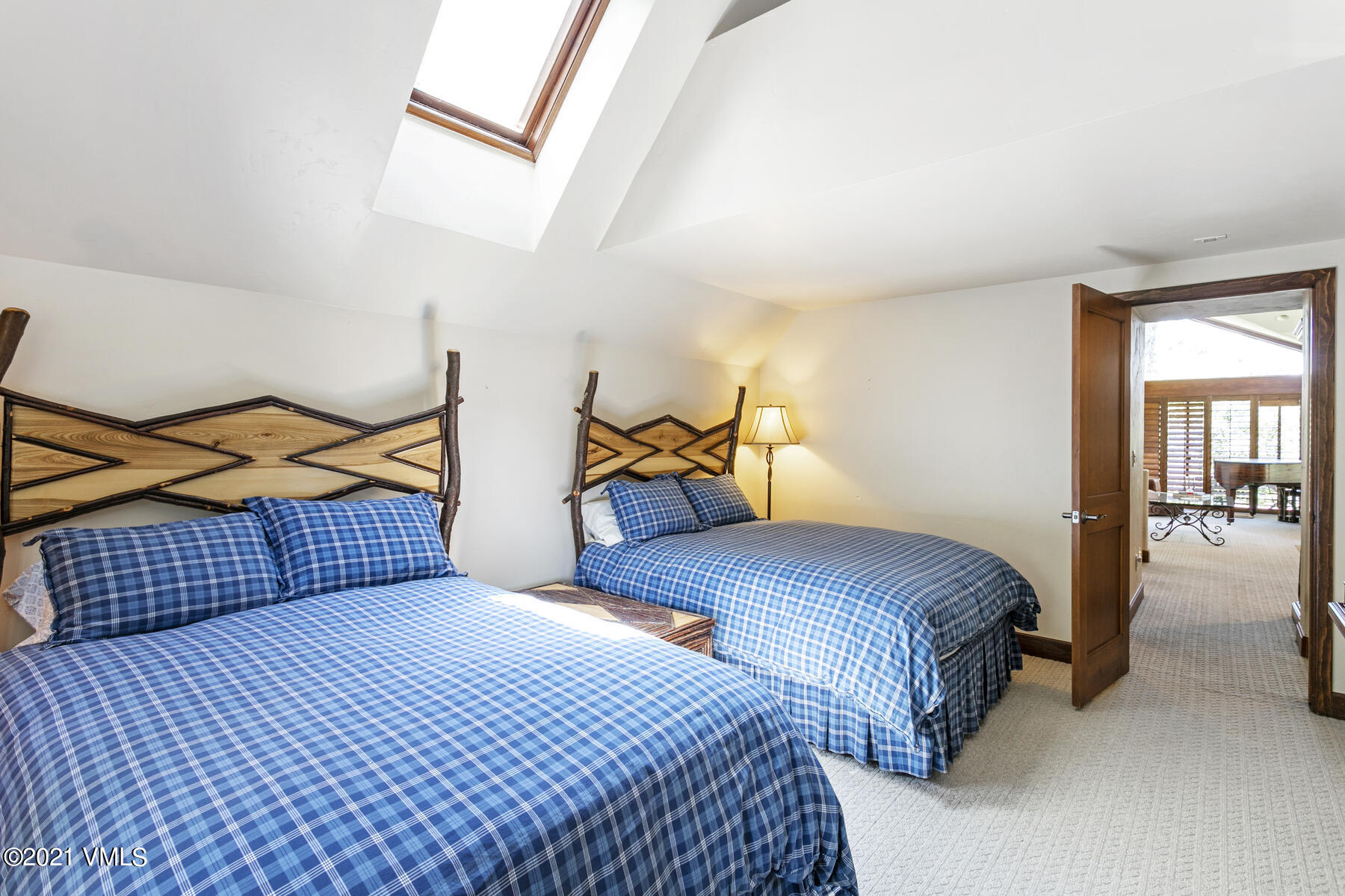 850 Eagle Drive Eagle-Vail, CO 81620 - Photo 23 of 44 a bedroom with a bed and window