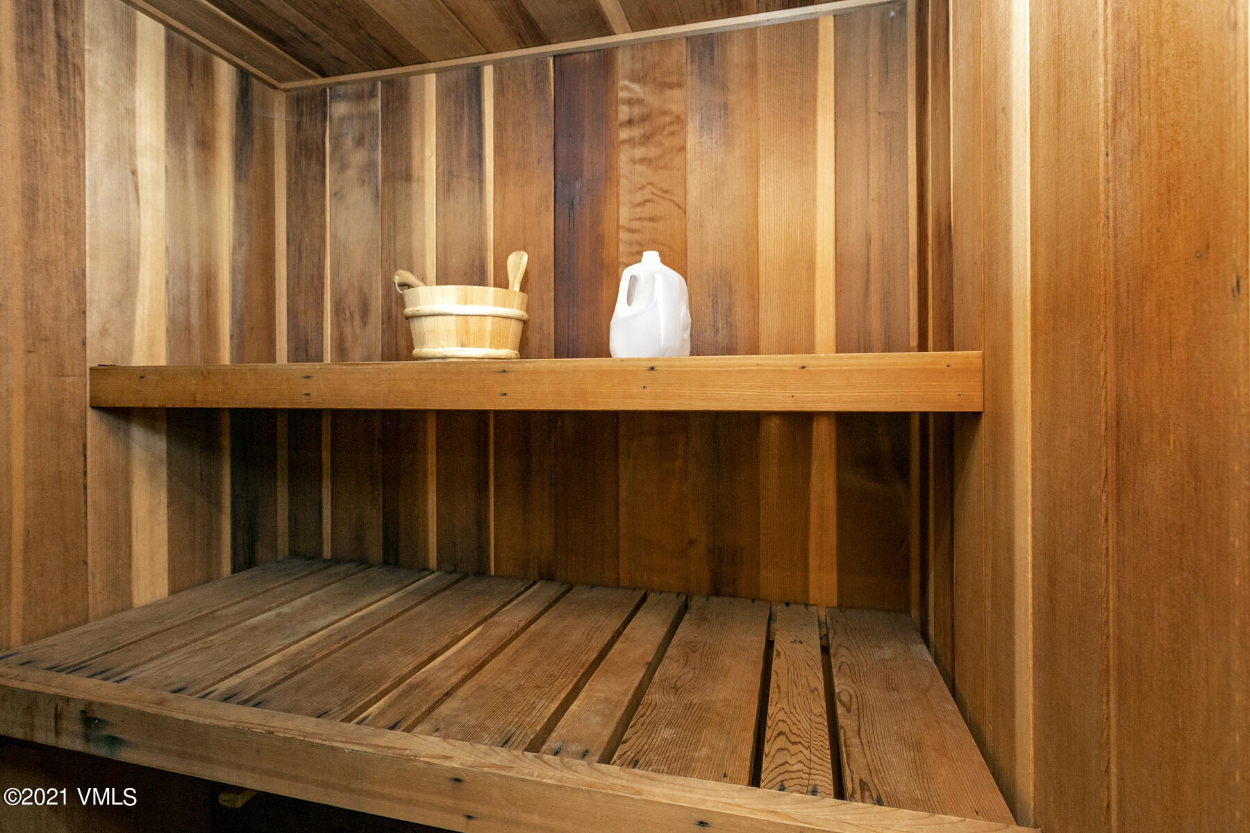 850 Eagle Drive Eagle-Vail, CO 81620 - Photo 29 of 44 a view of a room with wooden walls and a chair