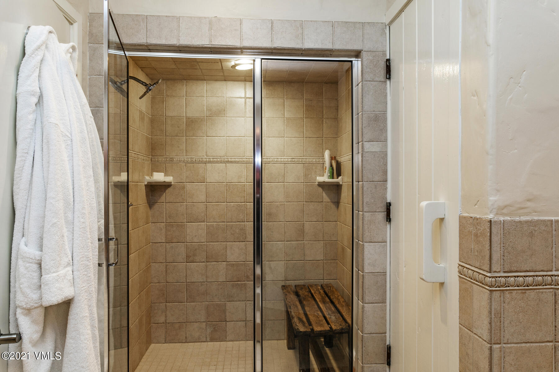 850 Eagle Drive Eagle-Vail, CO 81620 - Photo 30 of 44 a bathroom with a shower and a mirror