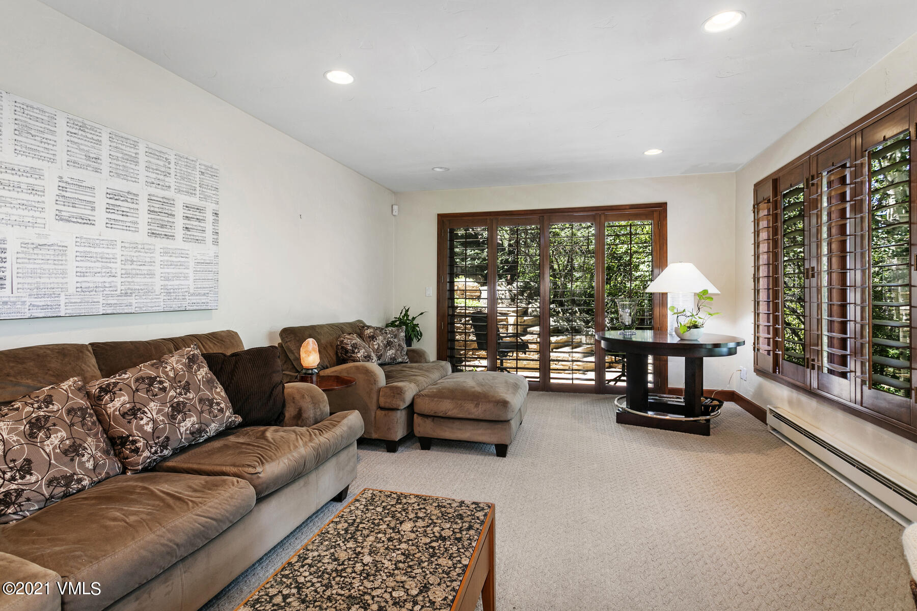 850 Eagle Drive Eagle-Vail, CO 81620 - Photo 4 of 44 a living room with furniture and floor to ceiling windows