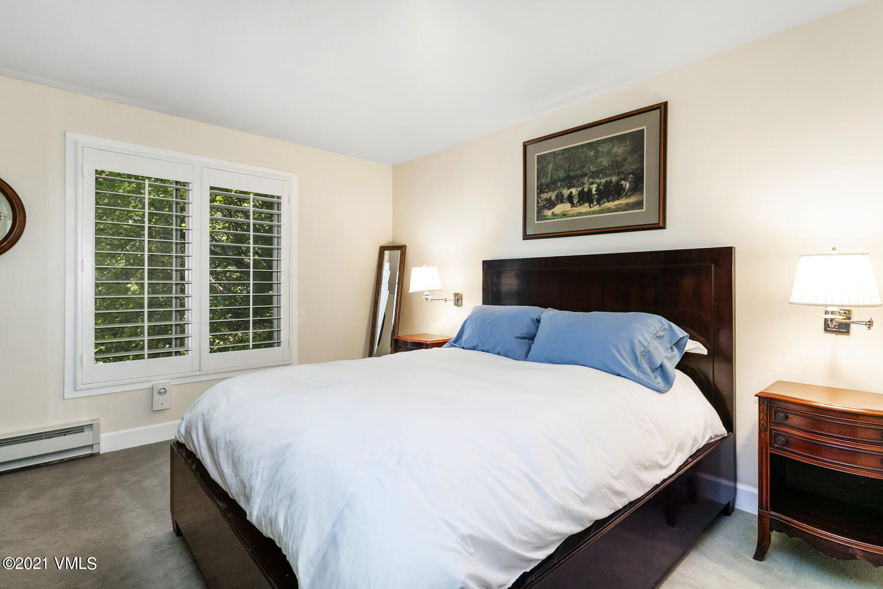 850 Eagle Drive Eagle-Vail, CO 81620 - Photo 41 of 44 a large bed sitting in a bedroom next to a window