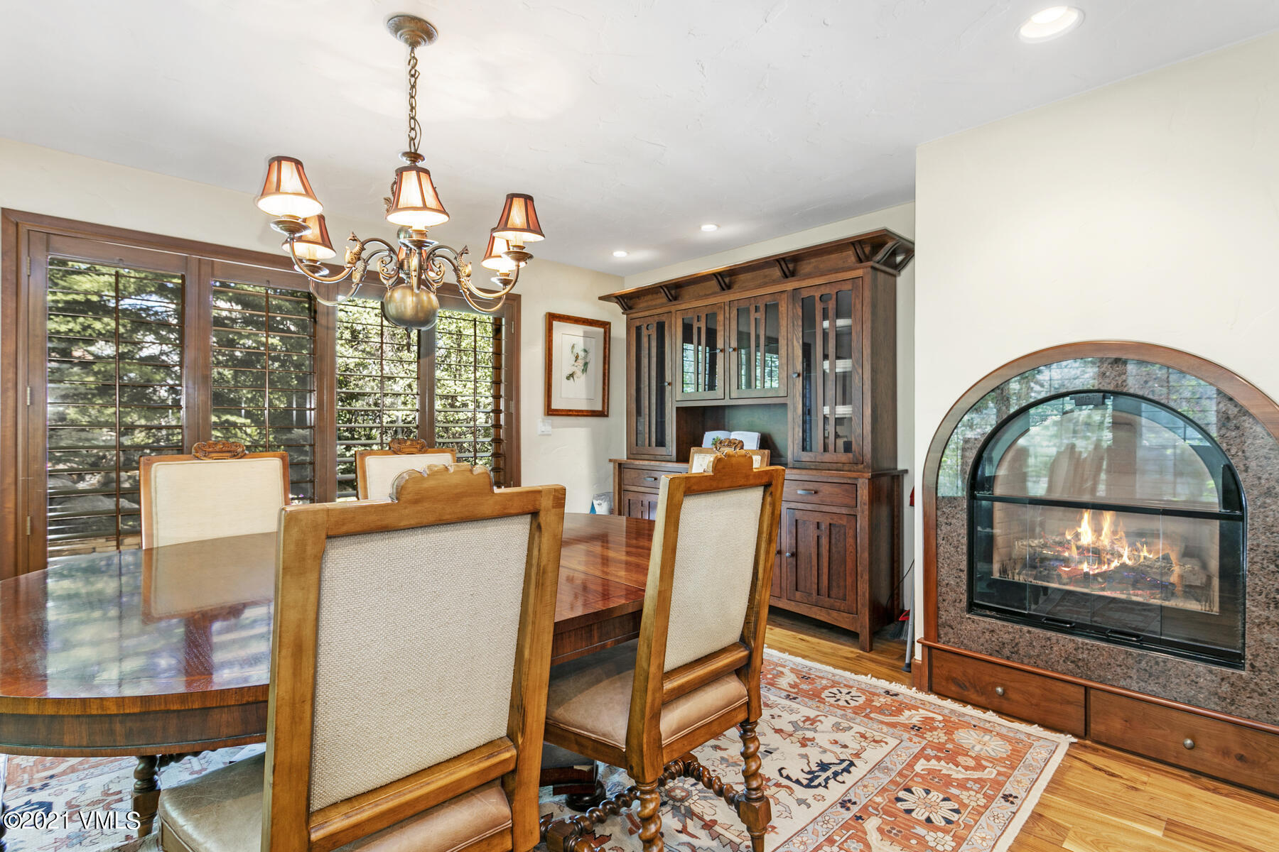 850 Eagle Drive Eagle-Vail, CO 81620 - Photo 8 of 44 a dining room with furniture a chandelier and wooden floor