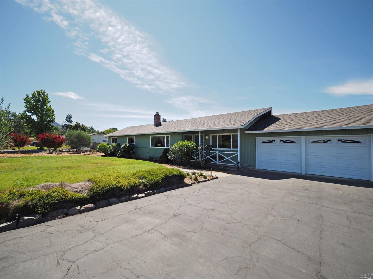 4550 Ranchette Road Santa Rosa, CA 95409 - Photo 1 of 1 a front view of house with yard and green space