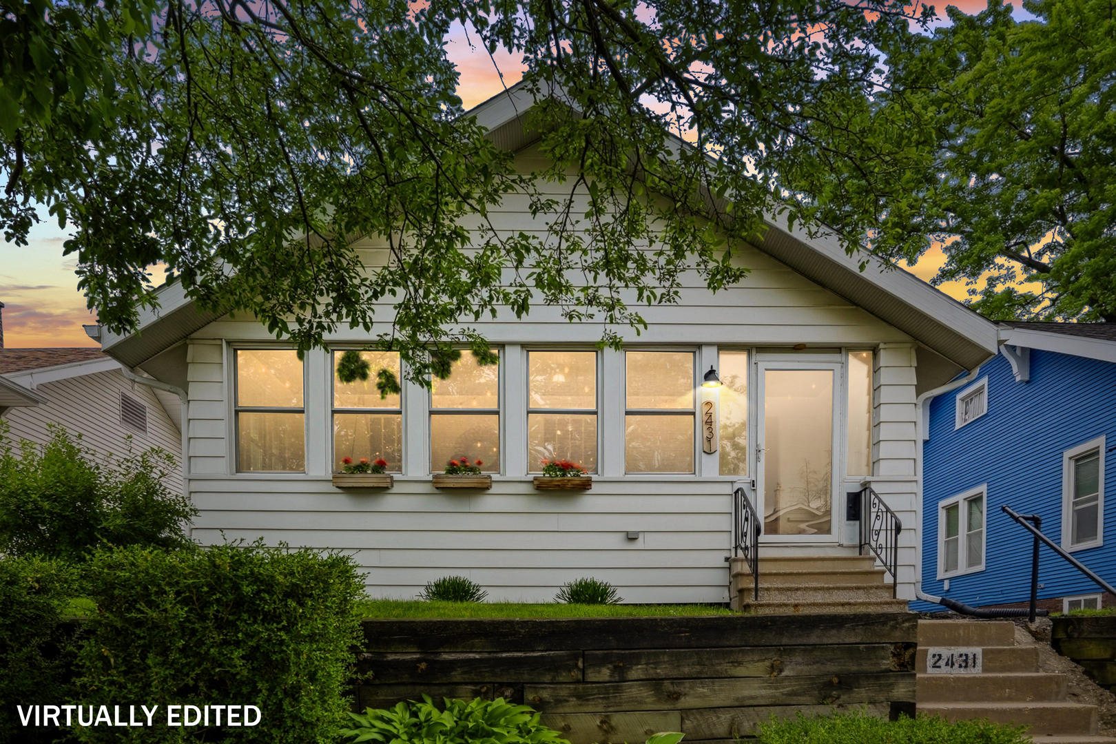 2431 14th Avenue Moline, IL 61265 - Photo 1 of 37 a view of front of house with a yard