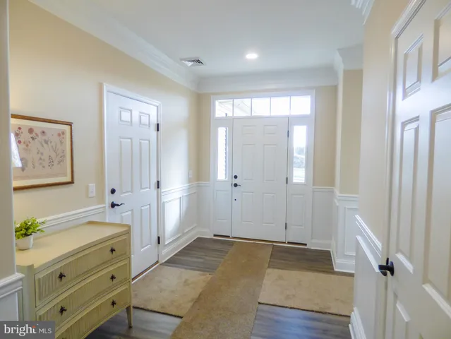 a view of room with window and hardwood floor