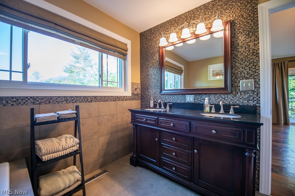5234 Ribbon Road Southwest Bowerston, OH 44695 - Photo 27 of 50 Spacious primary bathroom featuring a glass-enclosed shower.