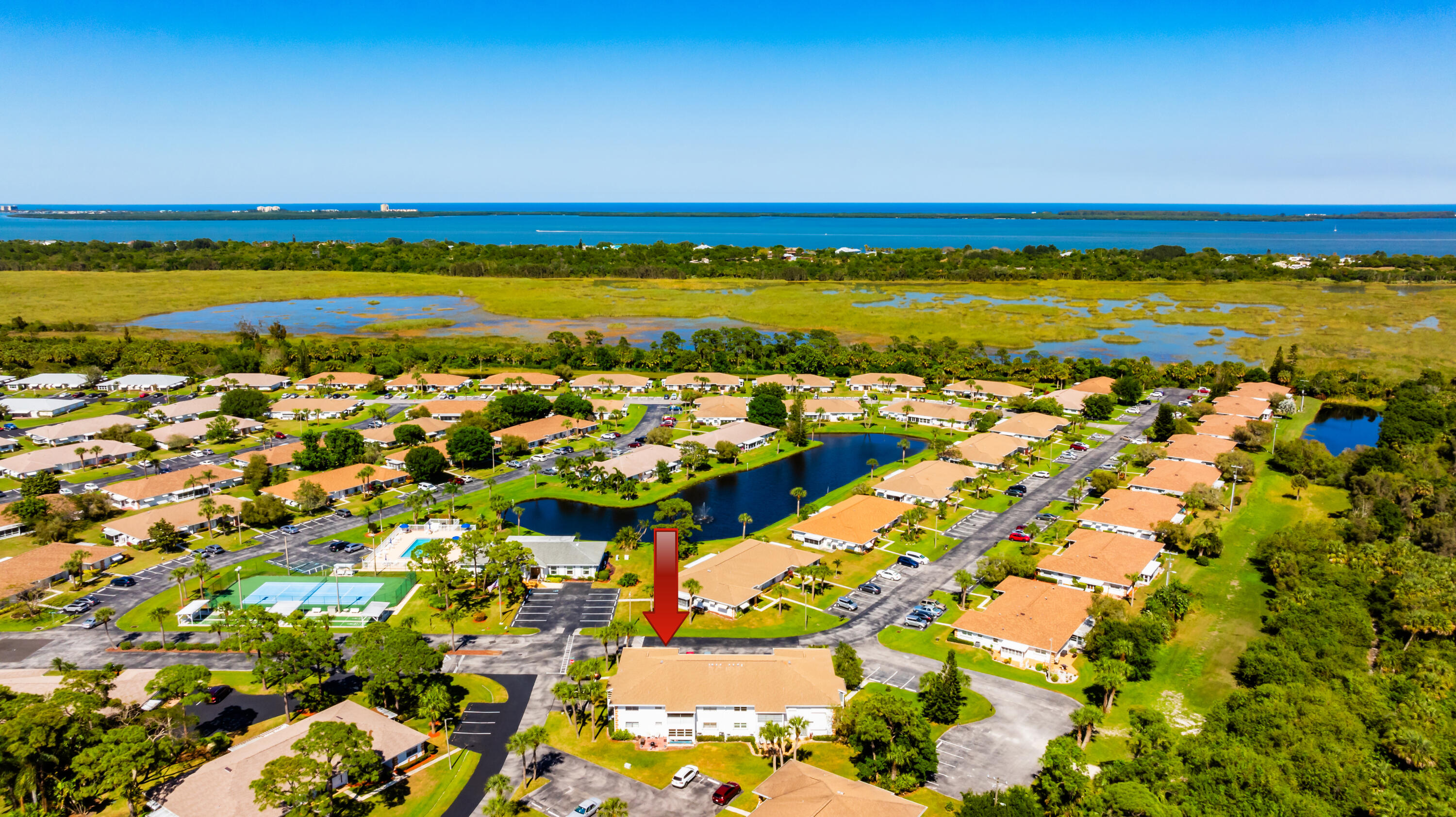 733 High Point Boulevard, Unit 1 Fort Pierce, FL 34982 - Photo 25 of 33 733 High Point Blvd Aerials-4_arrow