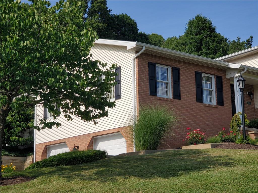 1760 Parkwood Road Indiana, PA 15701 - Photo 3 of 25 a front view of a house with a garden