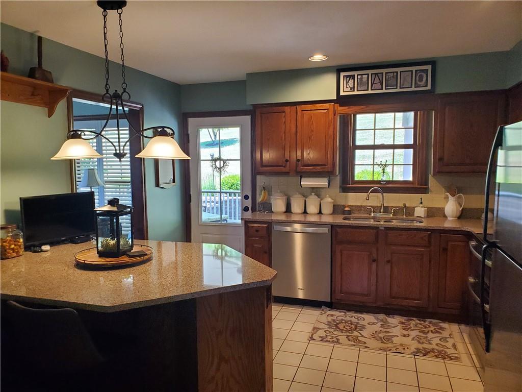 1760 Parkwood Road Indiana, PA 15701 - Photo 8 of 25 a kitchen with stainless steel appliances a sink stove and window