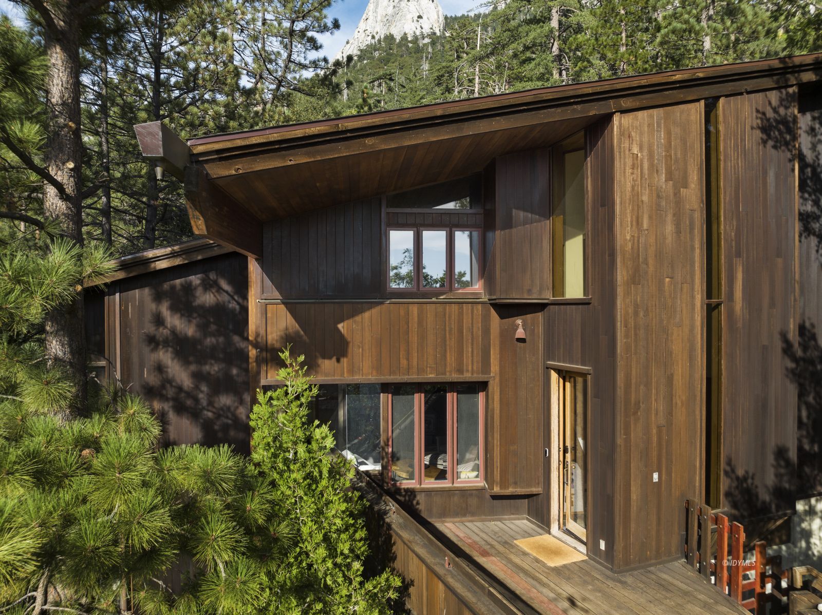 55526 Howland Road Idyllwild, CA 92549 - Photo 2 of 22 a front view of a house with a yard