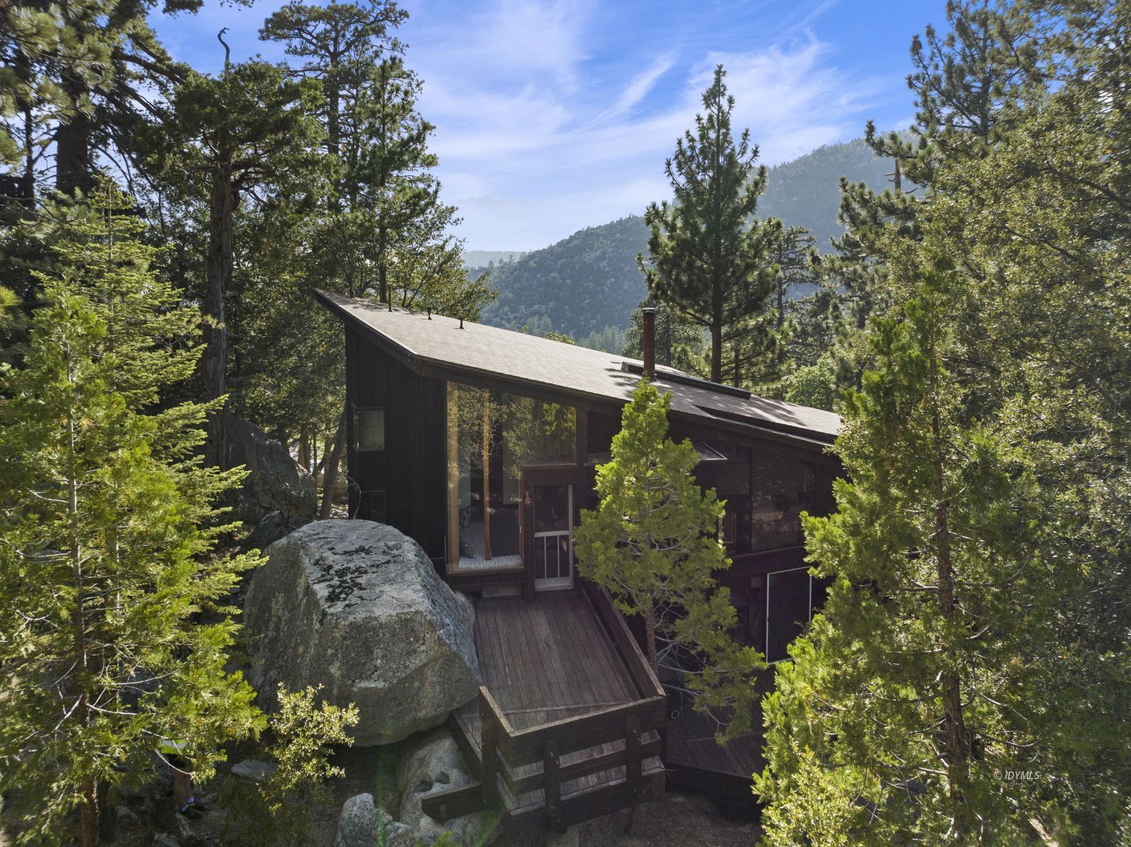 55526 Howland Road Idyllwild, CA 92549 - Photo 21 of 22 a view of a back yard of the house
