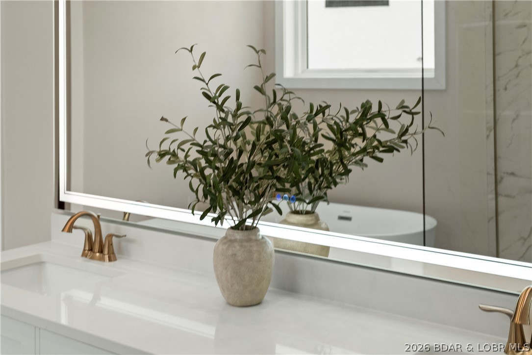 439 Red Bud Road Lake Ozark, MO 65049 - Photo 42 of 98 Premium plumbing fixtures and designer finishes re