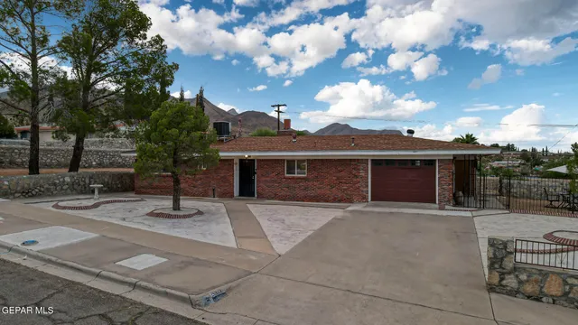a front view of a house with yard