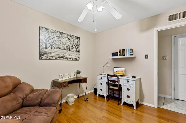 a livingroom with window and a couch