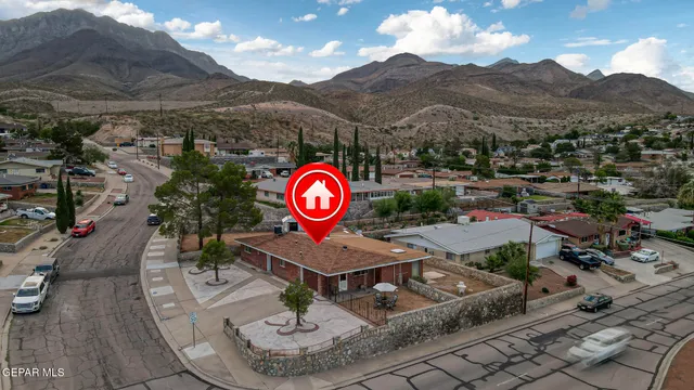 a view of a table and chairs in the patio