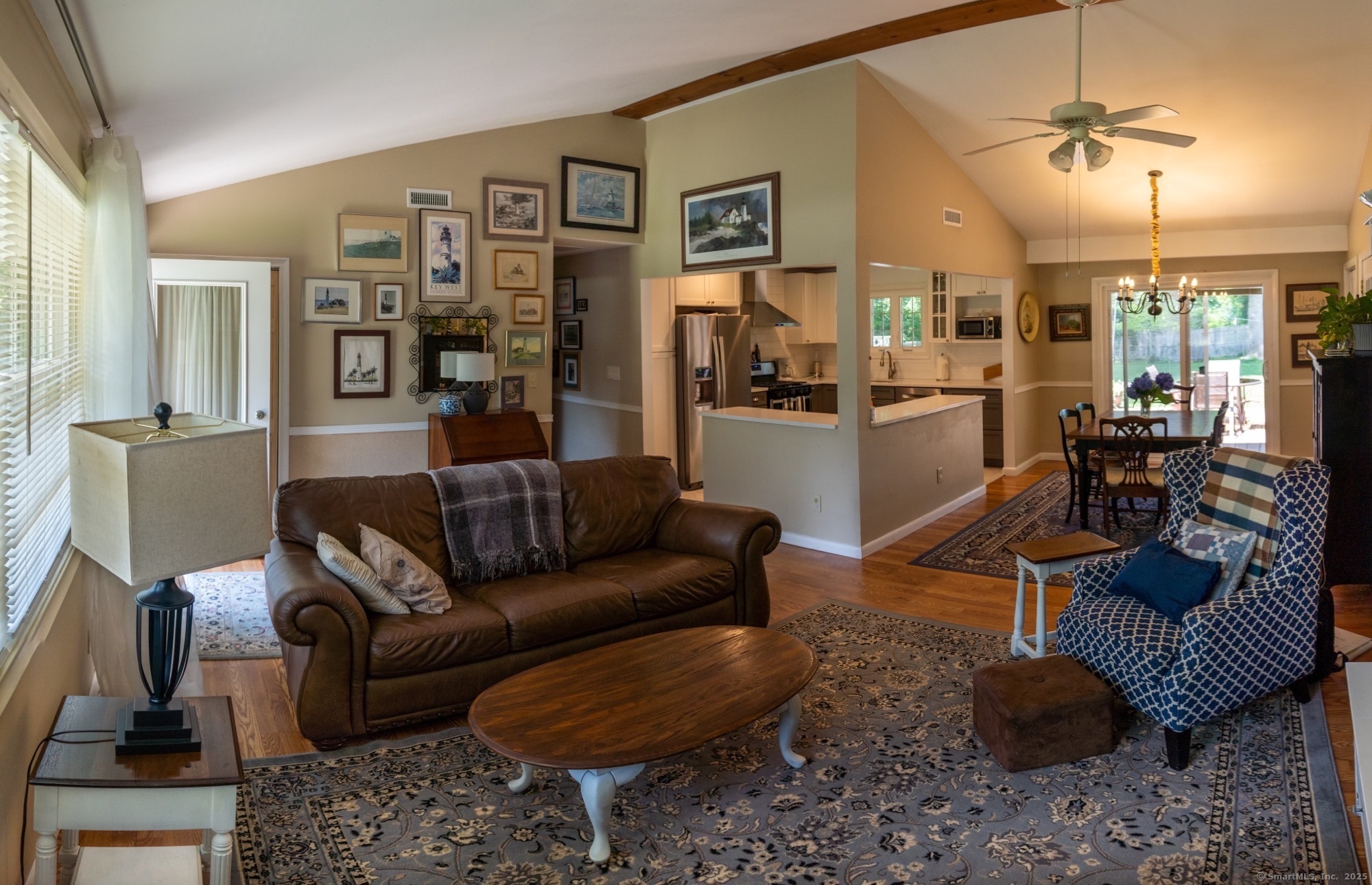 12 Allendale Road Old Saybrook, CT 06475 - Photo 12 of 36 a living room with furniture and a chandelier