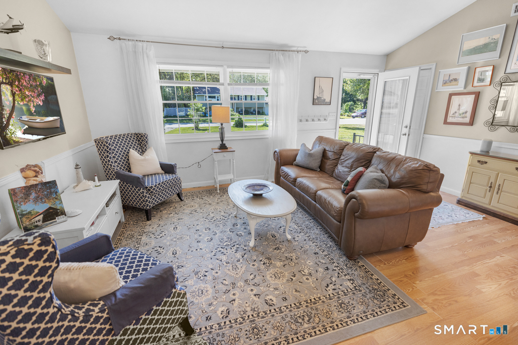 12 Allendale Road Old Saybrook, CT 06475 - Photo 17 of 36 a living room with furniture or couch and a window