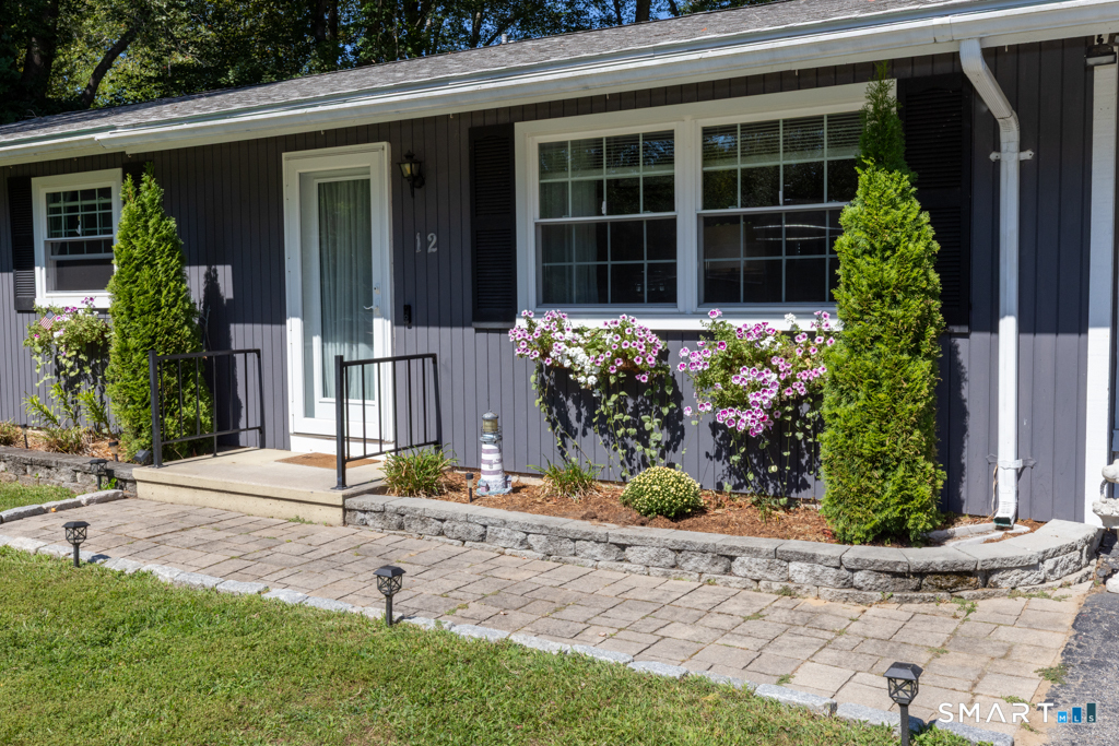 12 Allendale Road Old Saybrook, CT 06475 - Photo 3 of 36 front view of a house with a yard