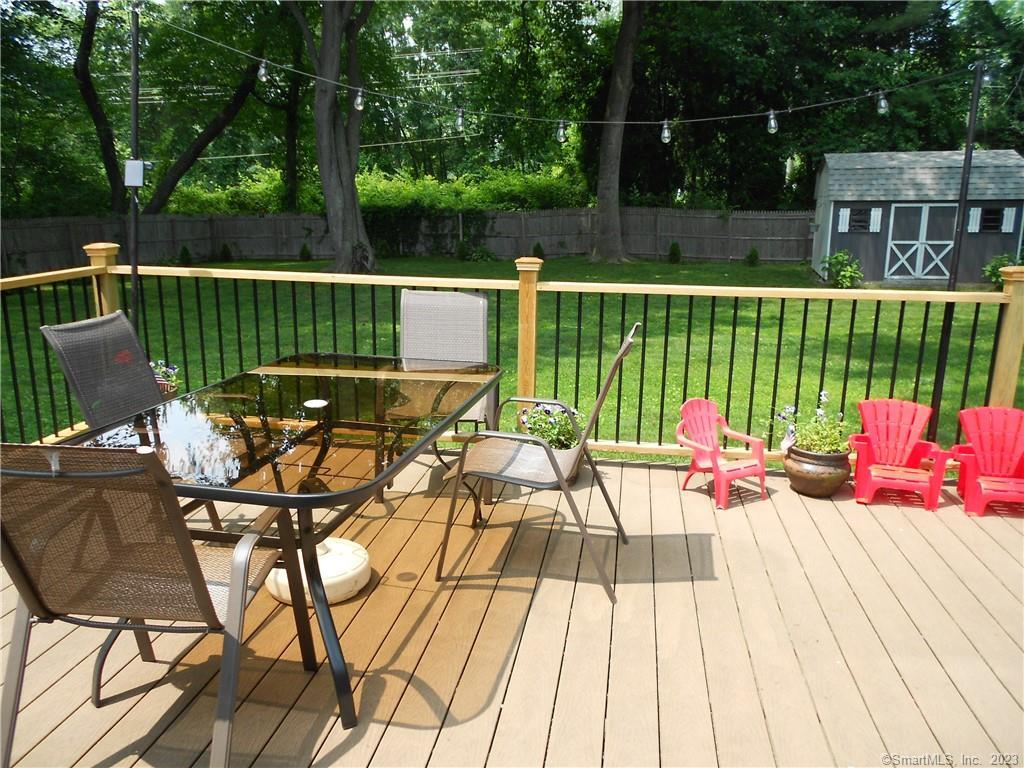 12 Allendale Road Old Saybrook, CT 06475 - Photo 34 of 36 a view of a chairs and table on the terrace