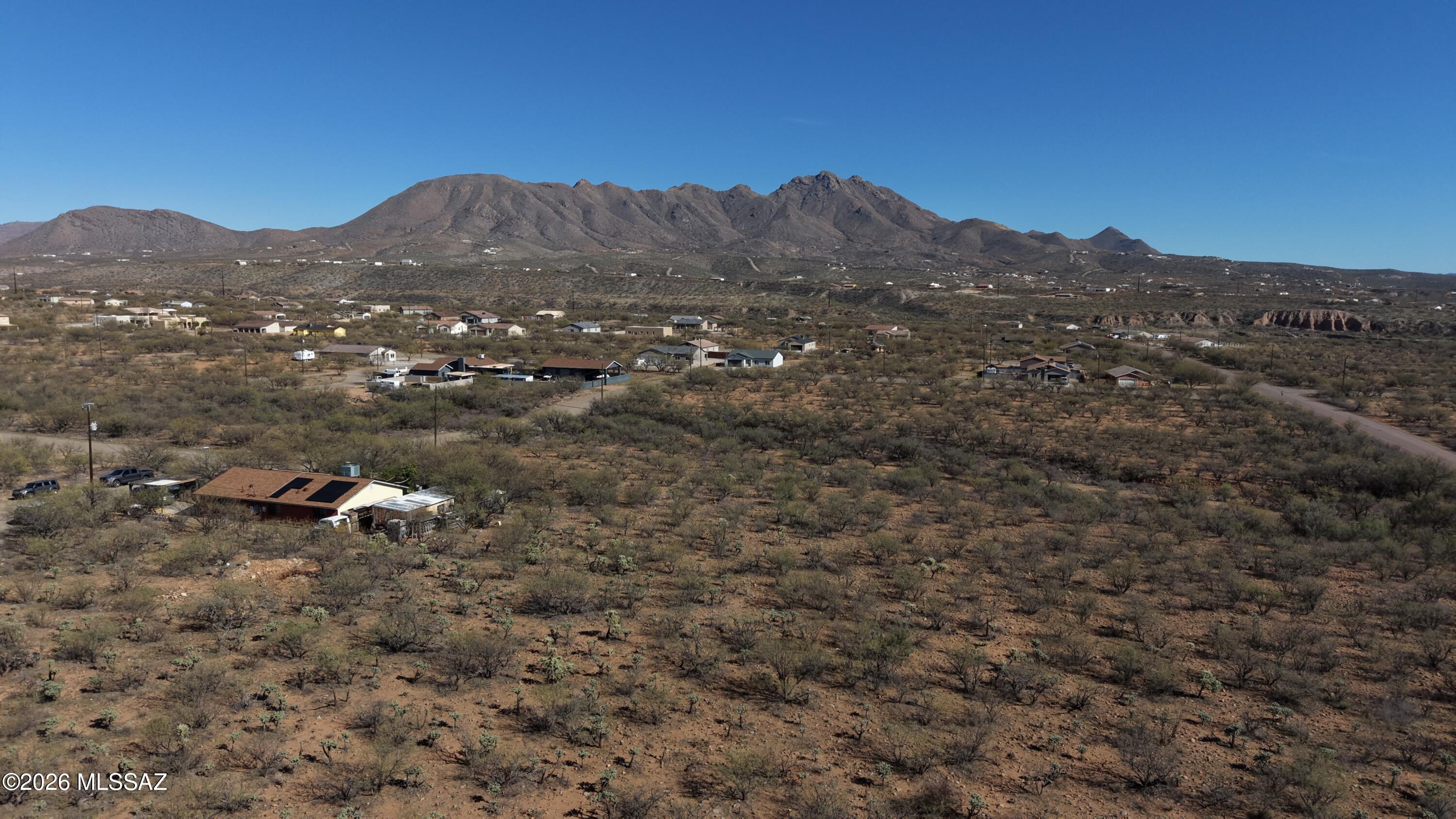 17027 South Sierrita Mountain Road Tucson, AZ 85736 - Photo 16 of 34 a view of a mountain in the distance in a field