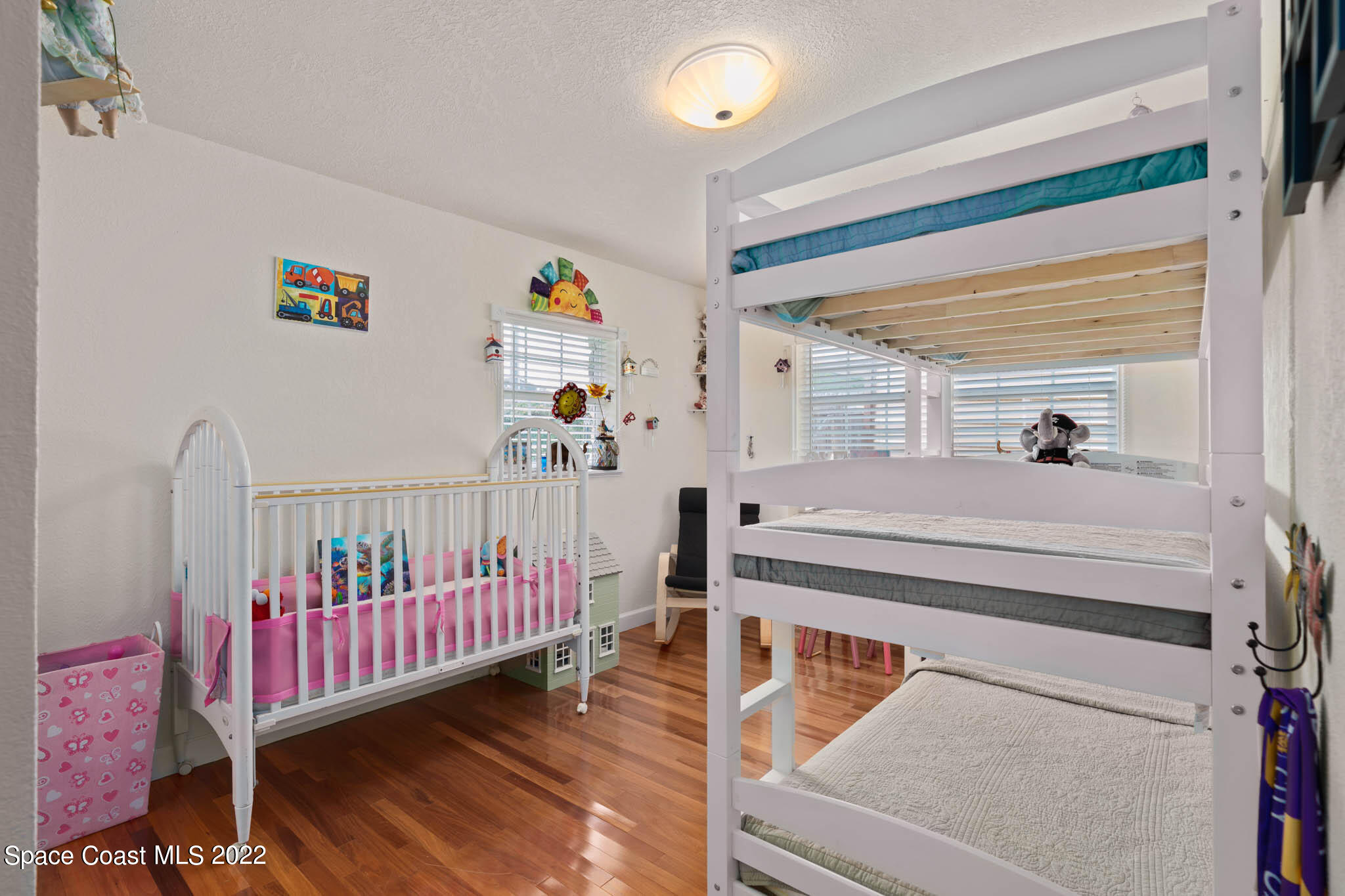 911 Bear Lake Road Apopka, FL 32703 - Photo 17 of 33 a bedroom with furniture and a window