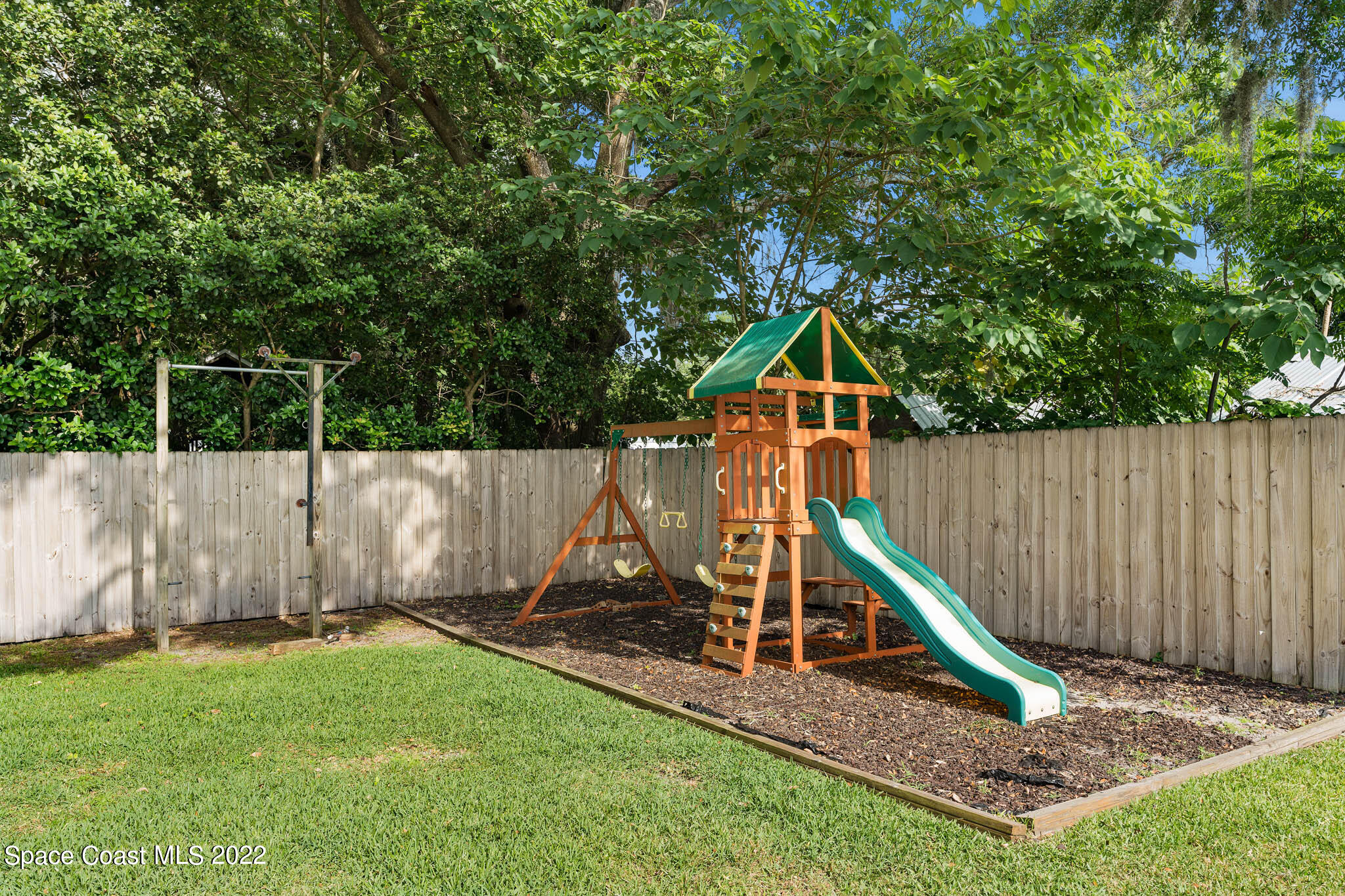 911 Bear Lake Road Apopka, FL 32703 - Photo 32 of 33 a view of a park with a slide