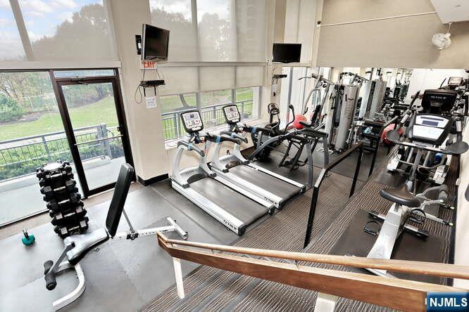 2 Horizon Road, Unit 404 Fort Lee, NJ 07024 - Photo 28 of 30 a view of a room with gym equipment