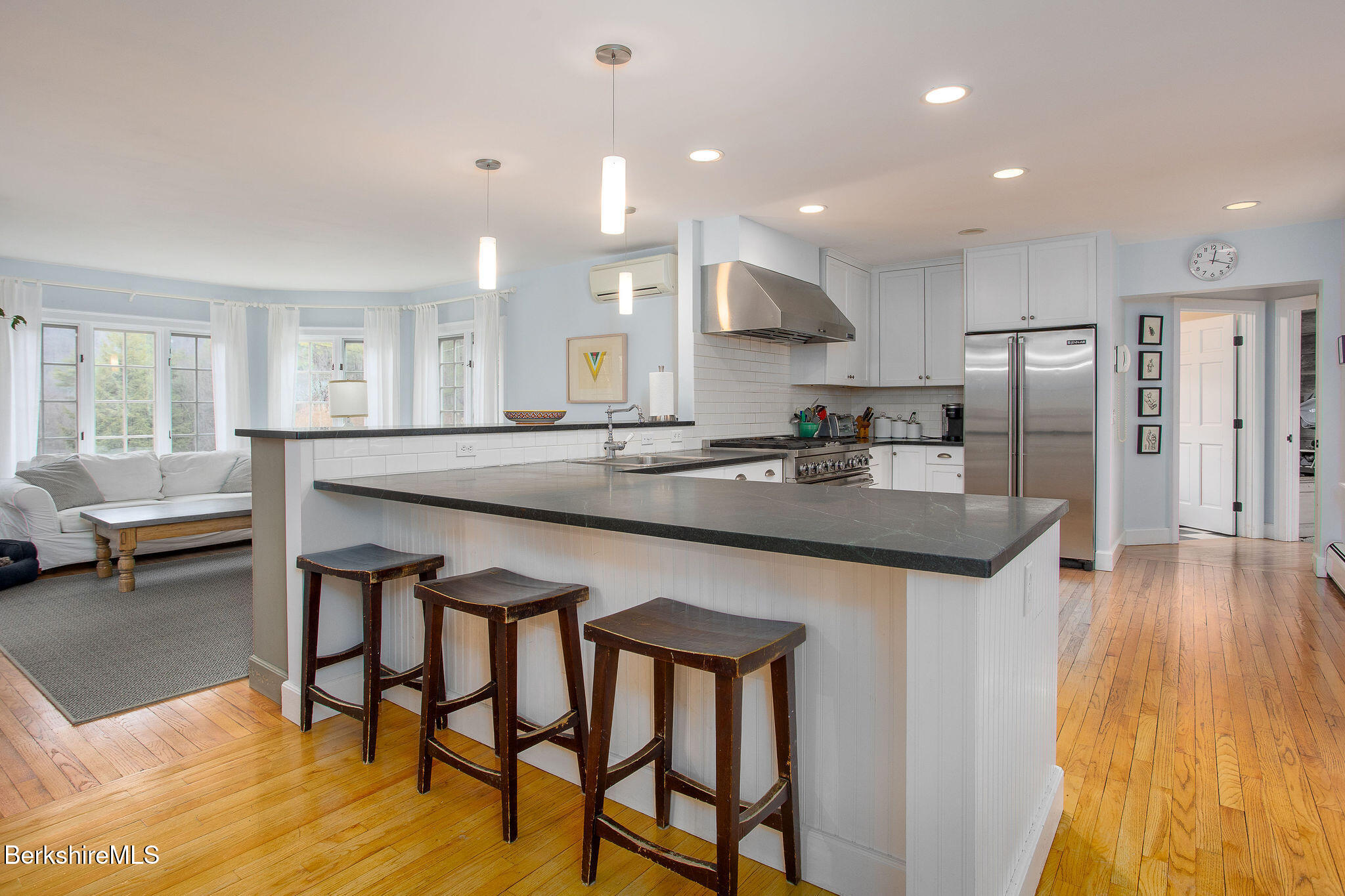14 Old Tree Farm Road Stockbridge, MA 01266 - Photo 14 of 50 a kitchen with stainless steel appliances granite countertop a kitchen island a stove a table and chairs