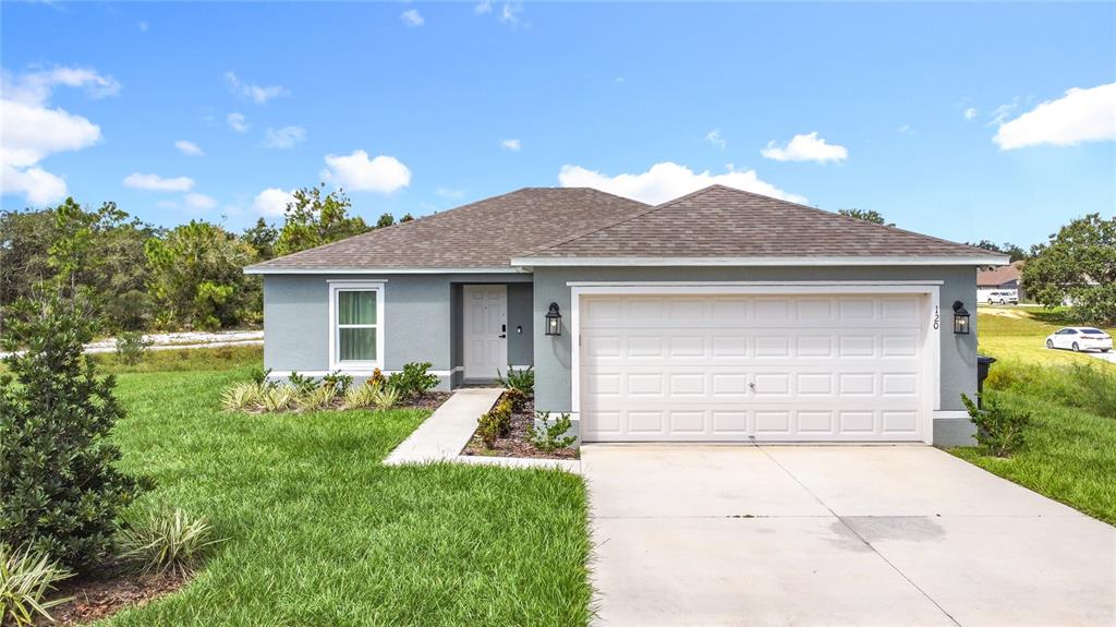 a front view of house with yard