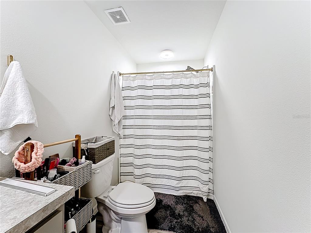 120 Bonito Way Kissimmee, FL 34759 - Photo 29 of 53 a bathroom with a toilet and a sink