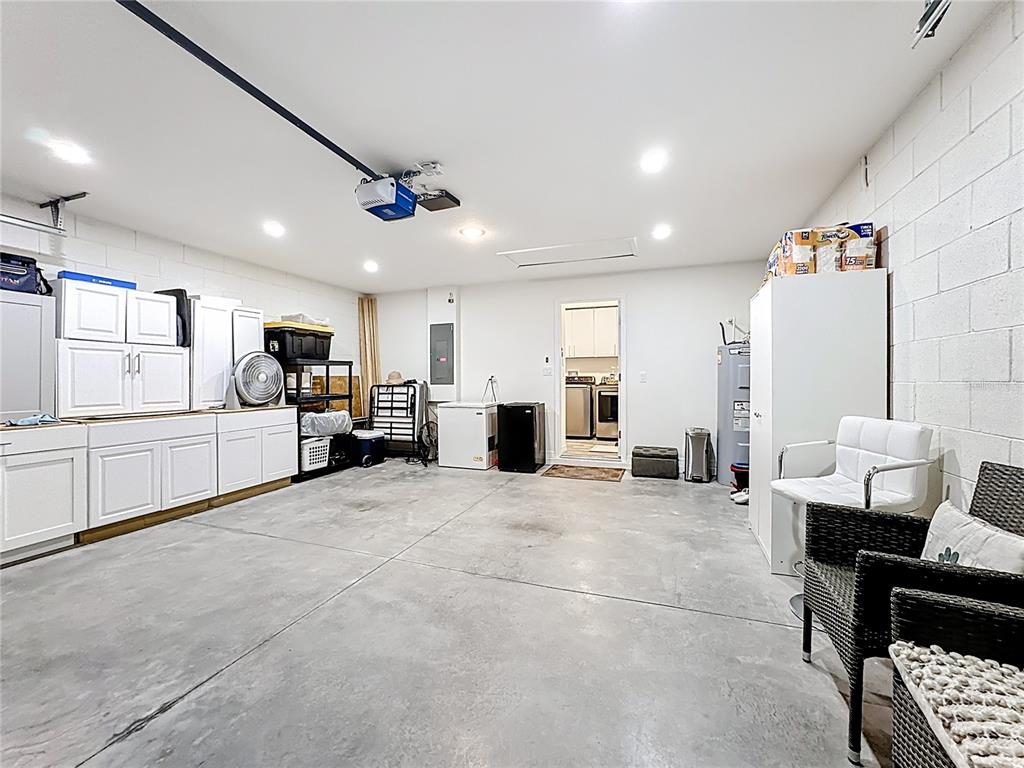 120 Bonito Way Kissimmee, FL 34759 - Photo 33 of 53 a large white room with furniture and a kitchen