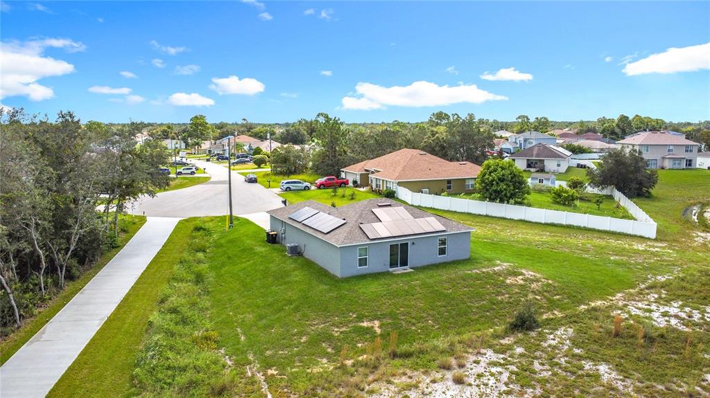 120 Bonito Way Kissimmee, FL 34759 - Photo 38 of 53 a swimming pool with outdoor seating and yard