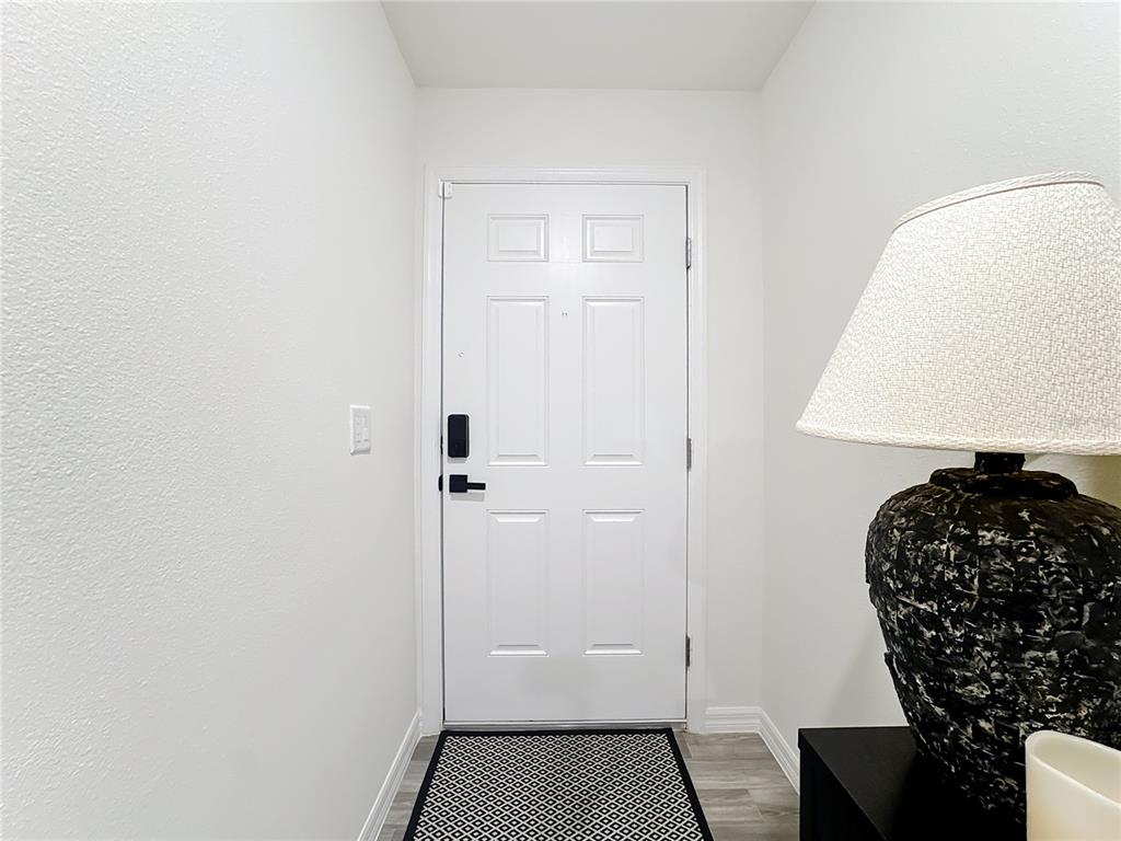120 Bonito Way Kissimmee, FL 34759 - Photo 4 of 53 a bathroom with a sink and a mirror