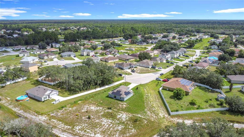 120 Bonito Way Kissimmee, FL 34759 - Photo 43 of 53 an aerial view of residential houses with outdoor space and trees