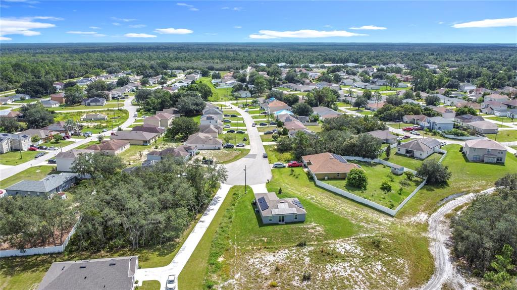 120 Bonito Way Kissimmee, FL 34759 - Photo 44 of 53 an aerial view of residential houses with outdoor space and trees