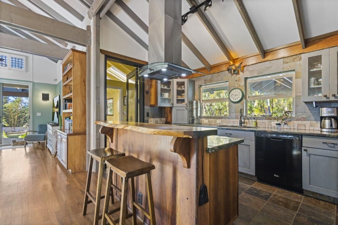 690 East Kuiaha Road Haiku, HI 96708 - Photo 14 of 30 a dining hall with stainless steel appliances granite countertop a stove and cabinets