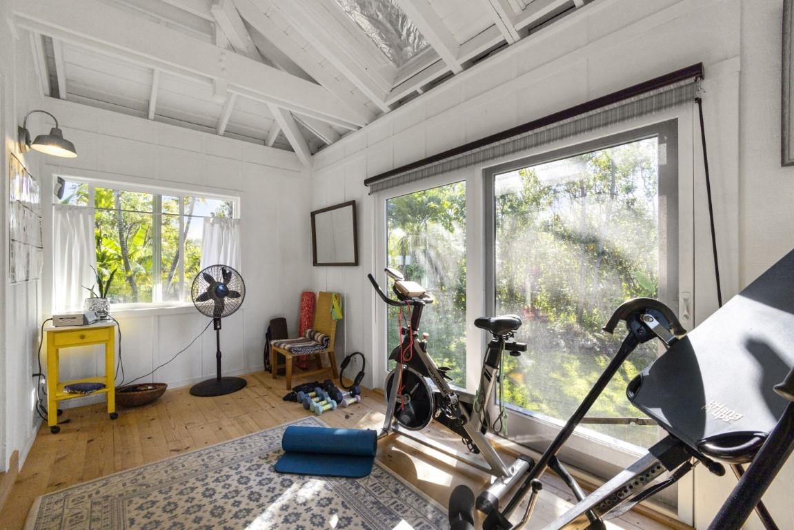 690 East Kuiaha Road Haiku, HI 96708 - Photo 18 of 30 a room with furniture gym equipment and windows