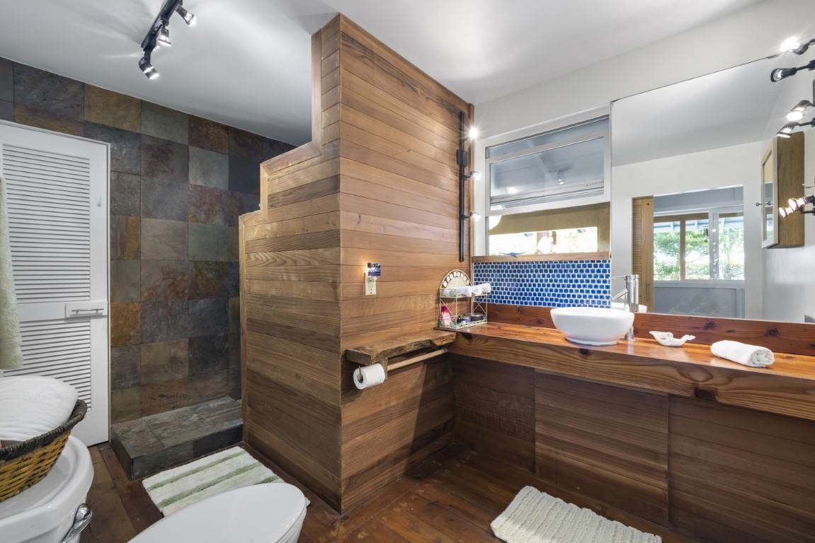 690 East Kuiaha Road Haiku, HI 96708 - Photo 19 of 30 a bathroom with a sink and a mirror